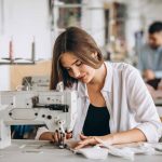 Woman tailor working at the sewing factory